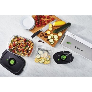 Vakuuminė pakavimo mašina FoodSaver VS0100X, sidabrinė/balta 2 Vakuuminė pakavimo mašina FoodSaver VS0100X, sidabrinė/balta 2